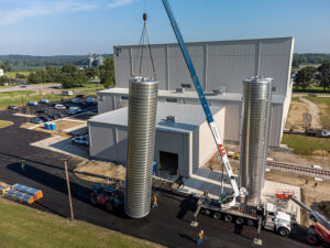 Drone image of silos being uprighted